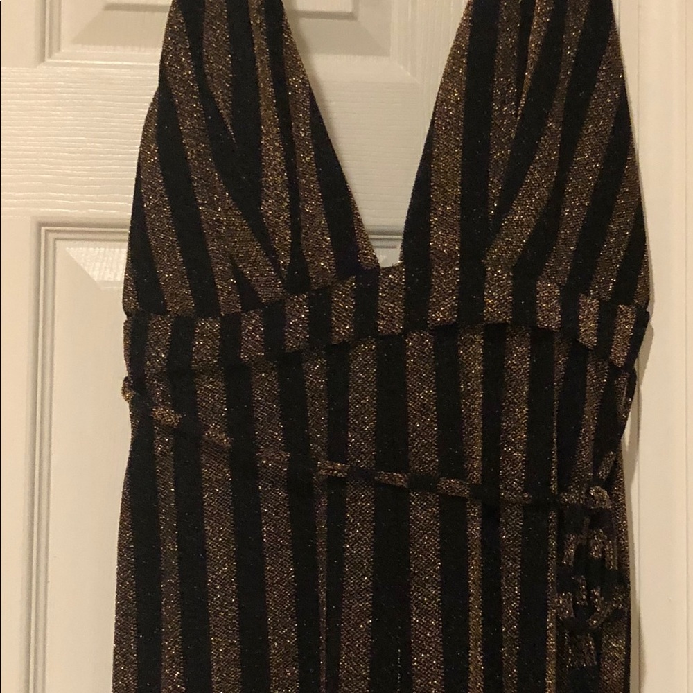 Sparkly black and gold fashion move jumpsuit